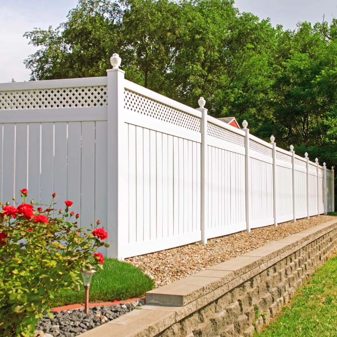 Vinyl fence installed along a property line in Lake City, FL
