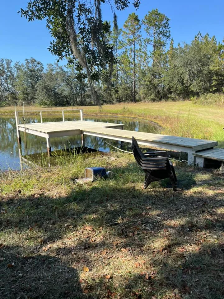 Wood dock built on a small pond