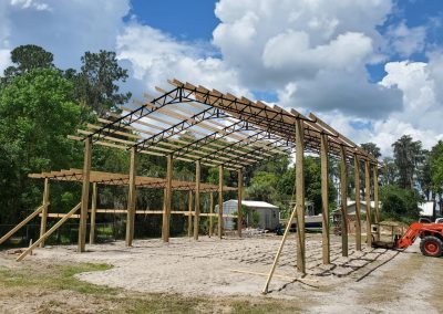 A pole barn being constructed