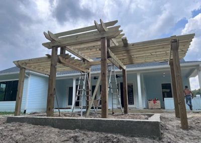 A wooden pergola being constructed