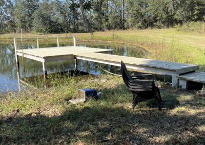 A dock on a small pond