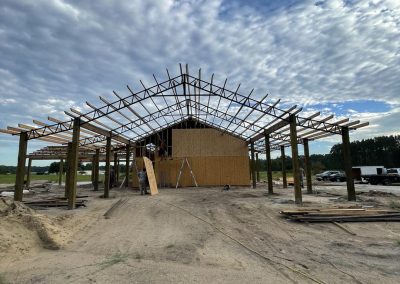 A pole barn being constructed